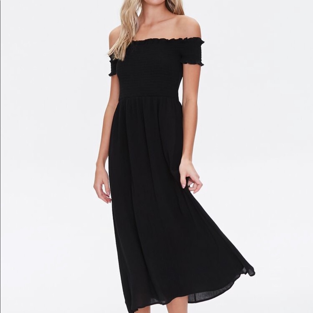 New and never worn black off the shoulder dress